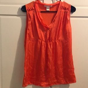 Orange sleeveless shirt !